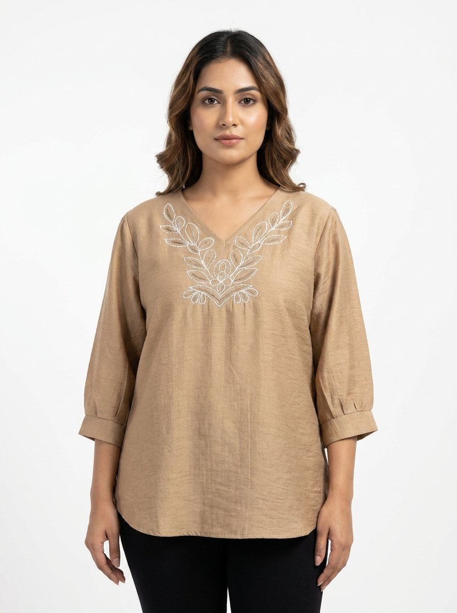 Beige_embroidered_top_on_model_202607282031