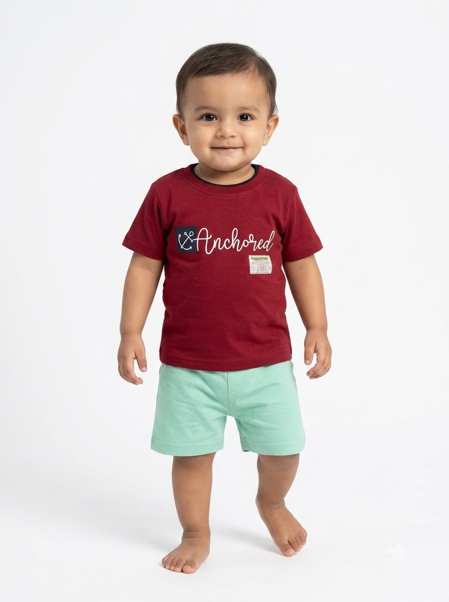 Baby_wearing_maroon_t-shirt_202608041228