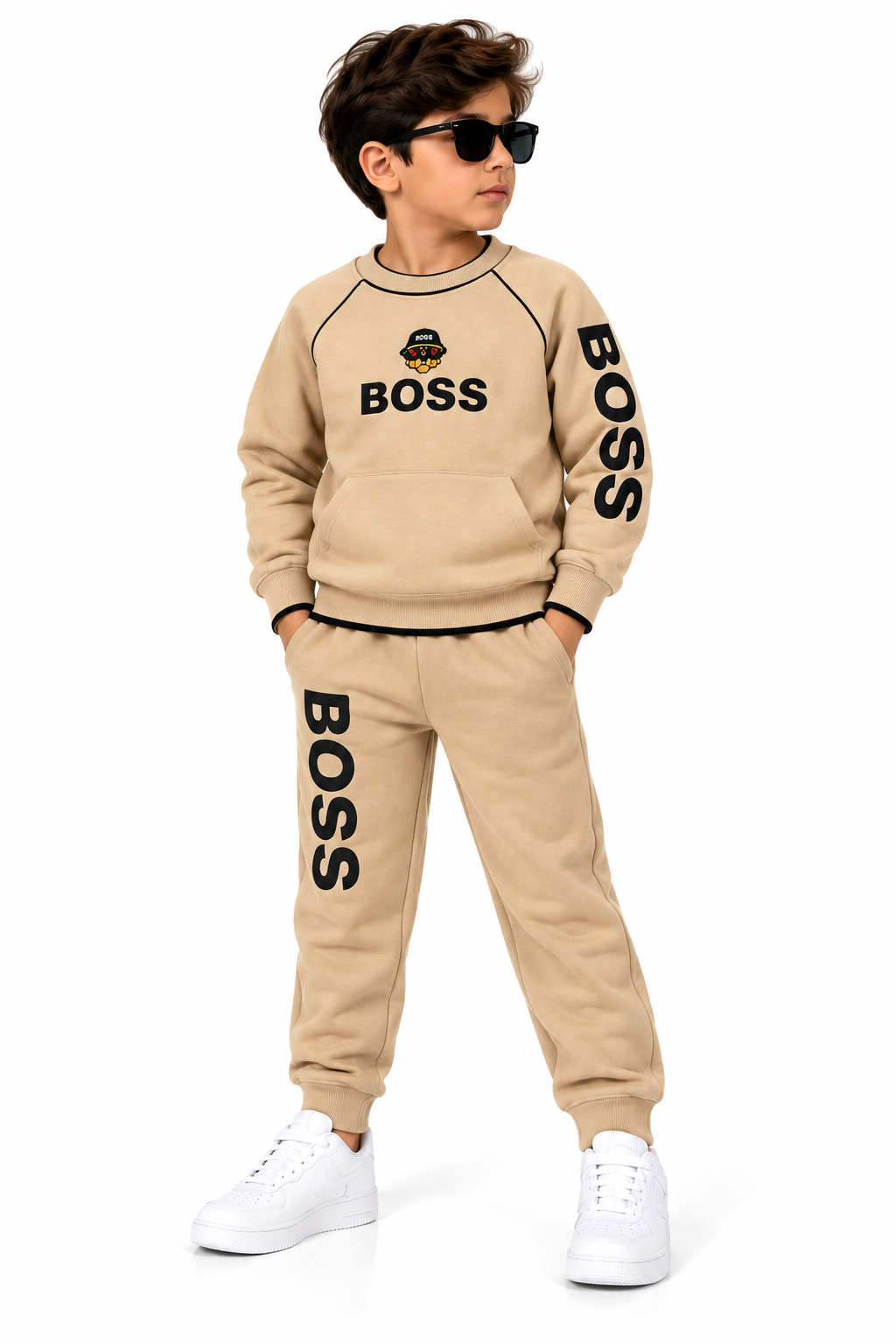 Young Boy in Beige BOSS Tracksuit