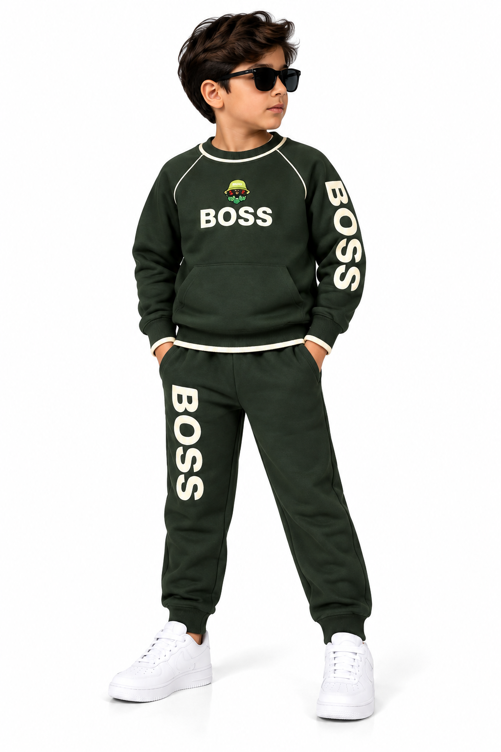 Young Boy in Green Boss Tracksuit
